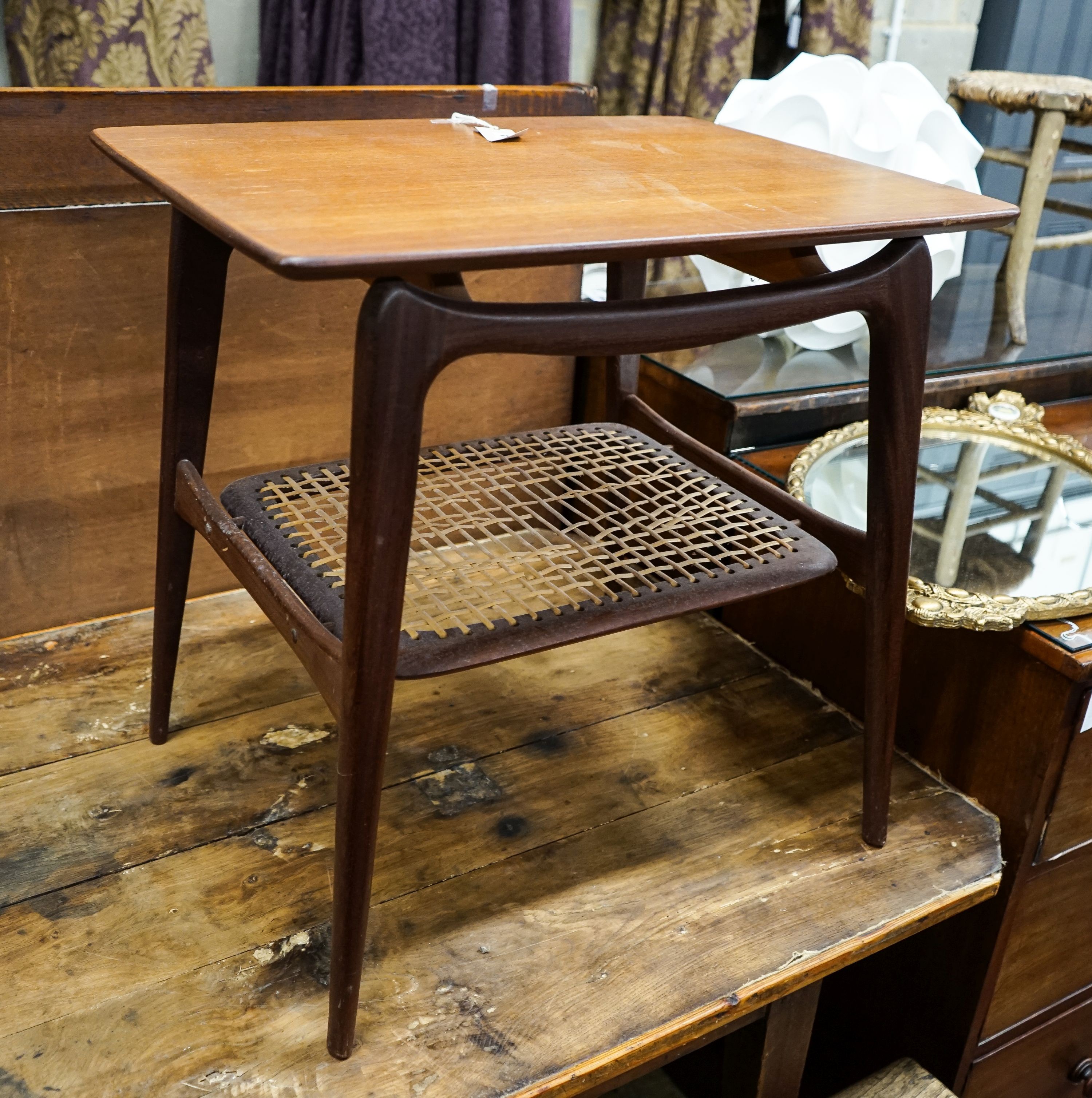 A Dutch 1950's 'Webe' rectangular teak occasional table attributed to Louis Van Teefellelen, with rattan undertier on plain tapered legs (label to underside), width 64cm, depth 49cm, height 63cm